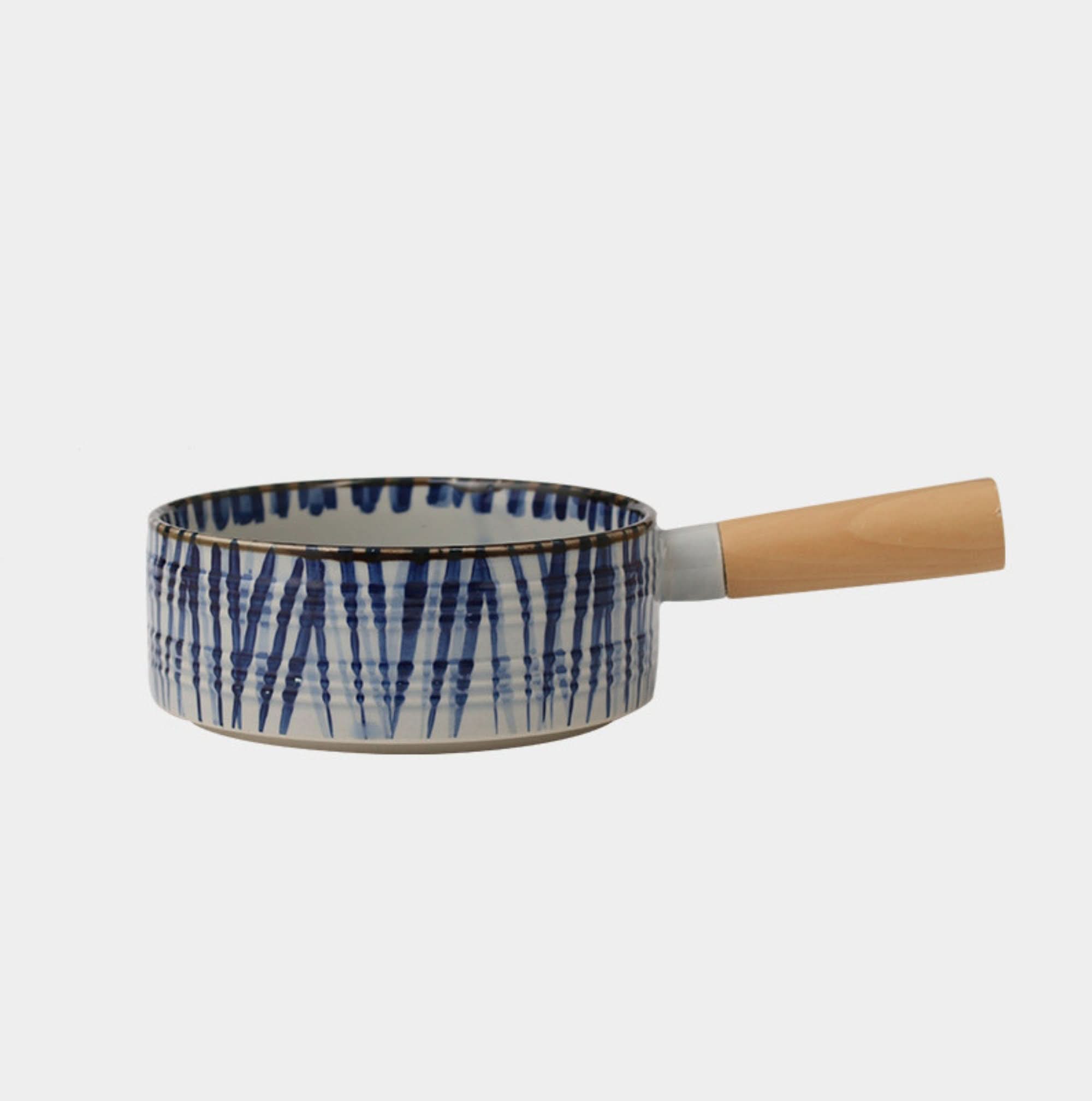Rustic stoneware baking plate with Japanese style blue art and wooden handle